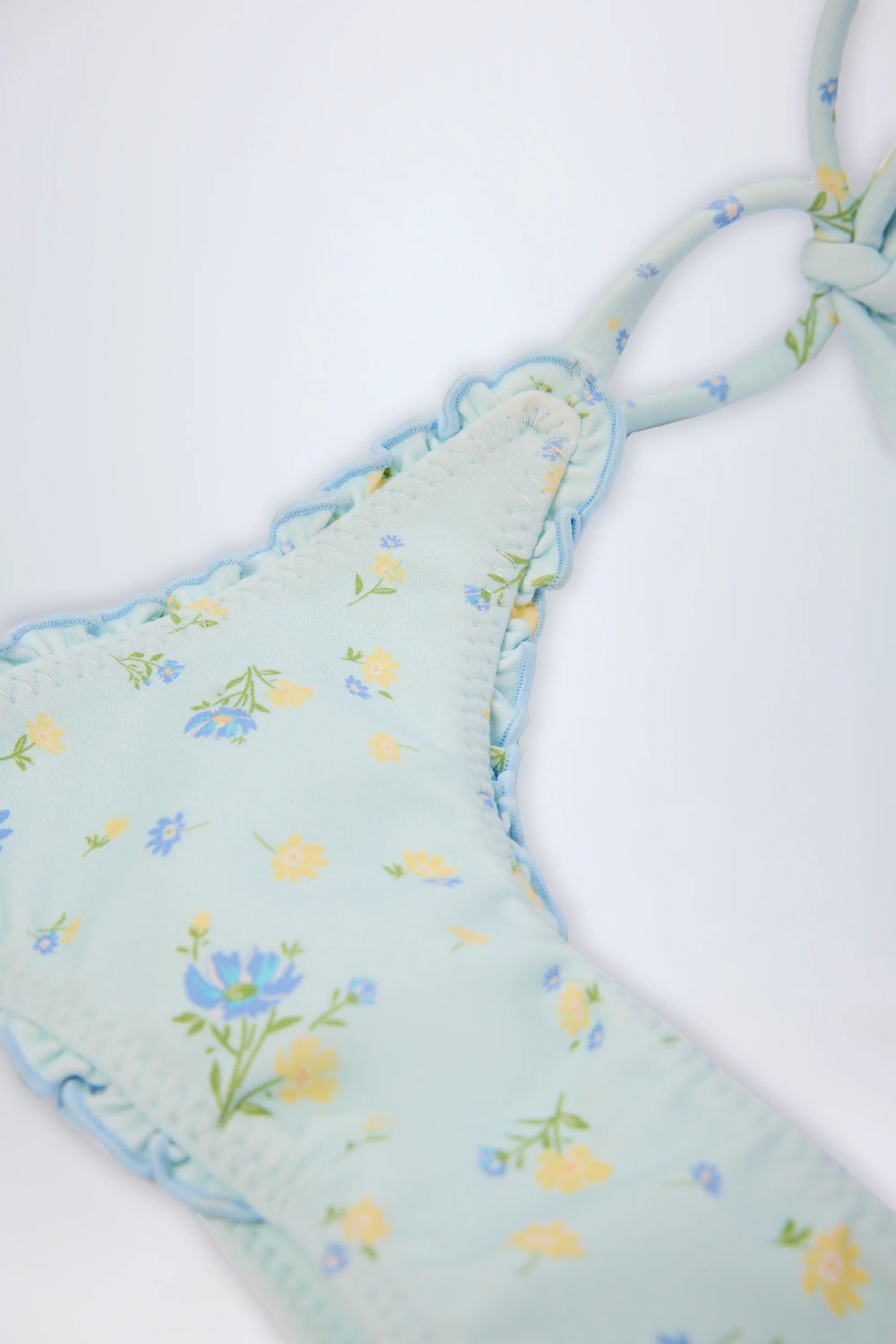 Side-Tie Thong Bikini Bottoms in Blue Floral - Image 5